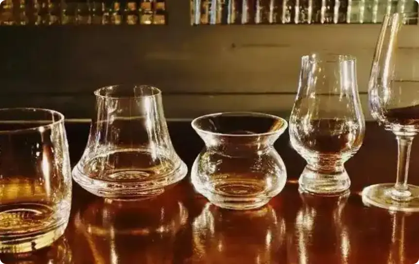 Sharing whiskey glasses